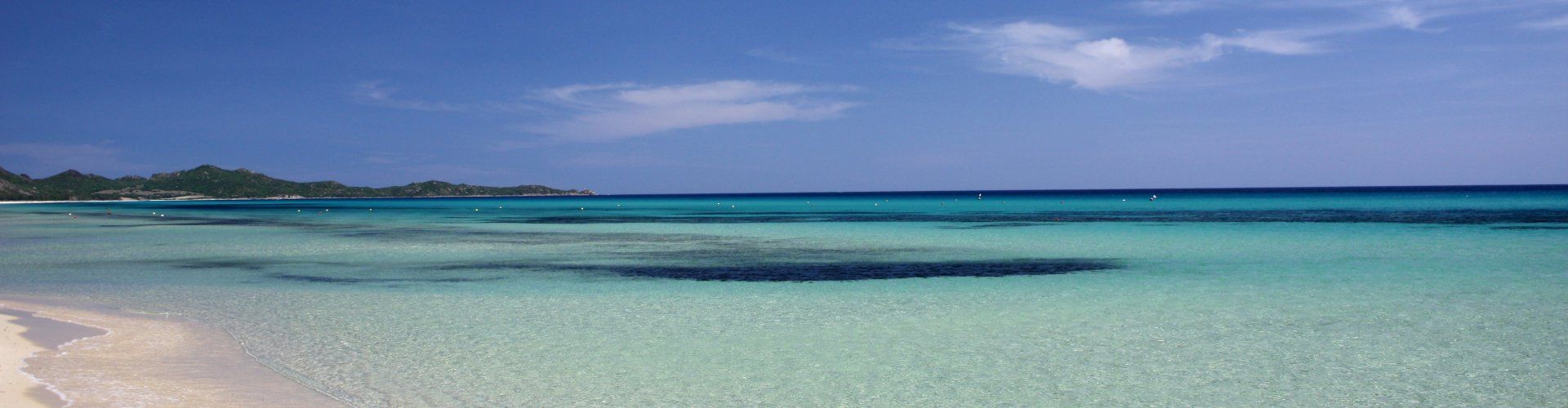 Crystal clear water on the beach of Costa Rei