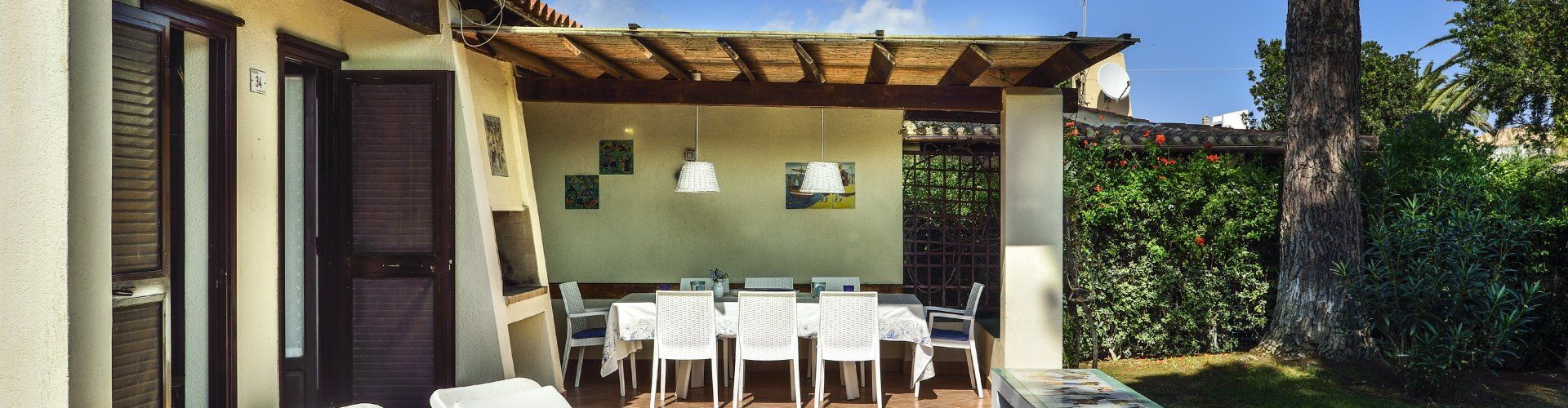 Villa Ibiscus | Big terrace with sunbeds and a roofed dining area Big terrace with sunbeds and a roofed dining area