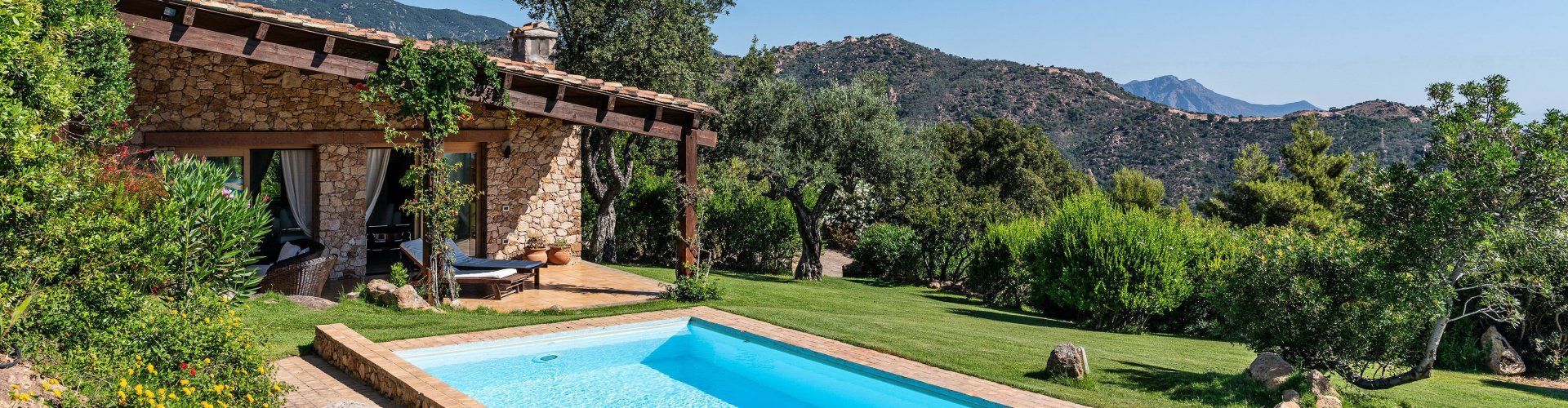 Villa with pool and green landscape