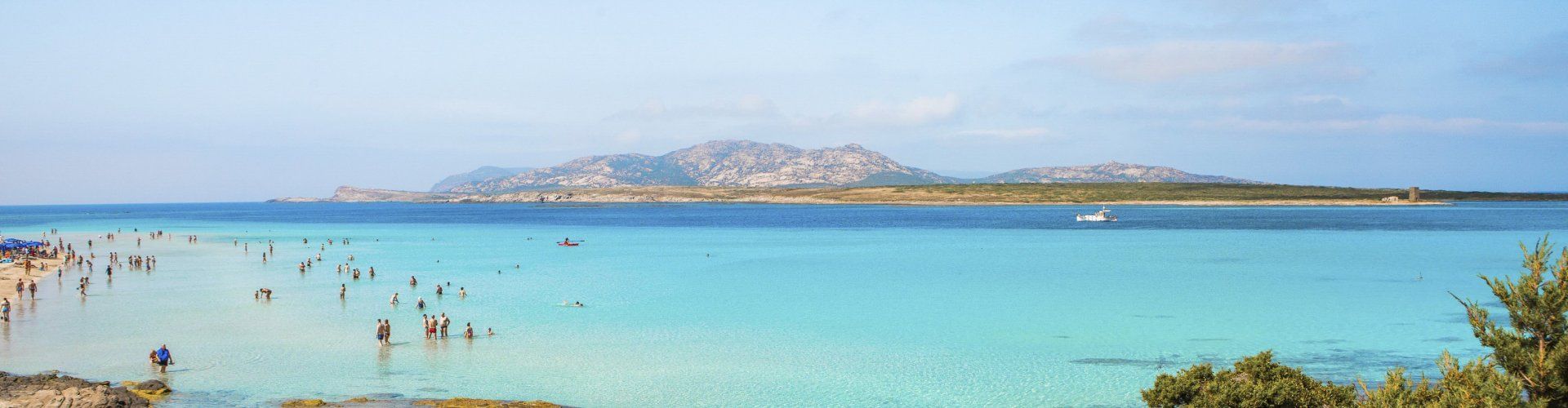 Crystal clear sea in front of the beach La Pelosa Stintino Crystal clear sea in front of the beach La Pelosa Stintino