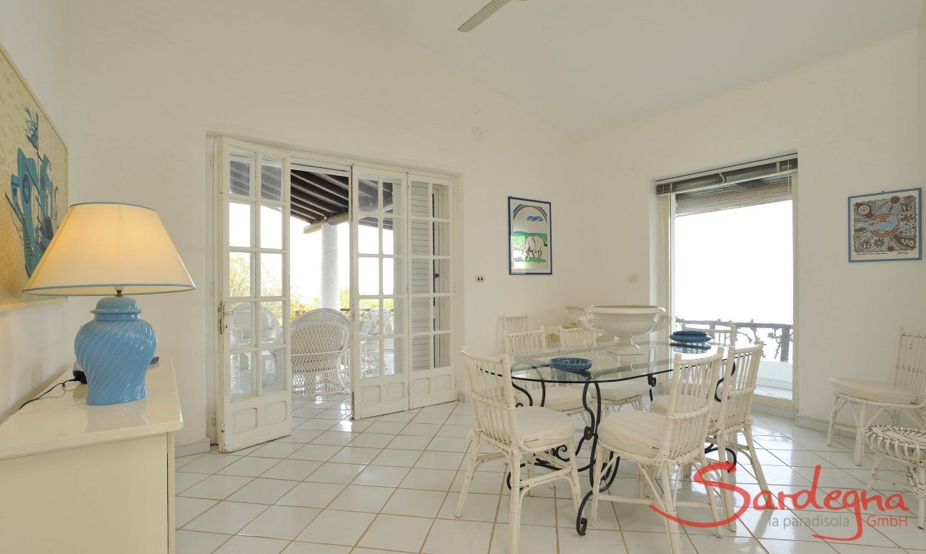 Dining area with doors to the terrace