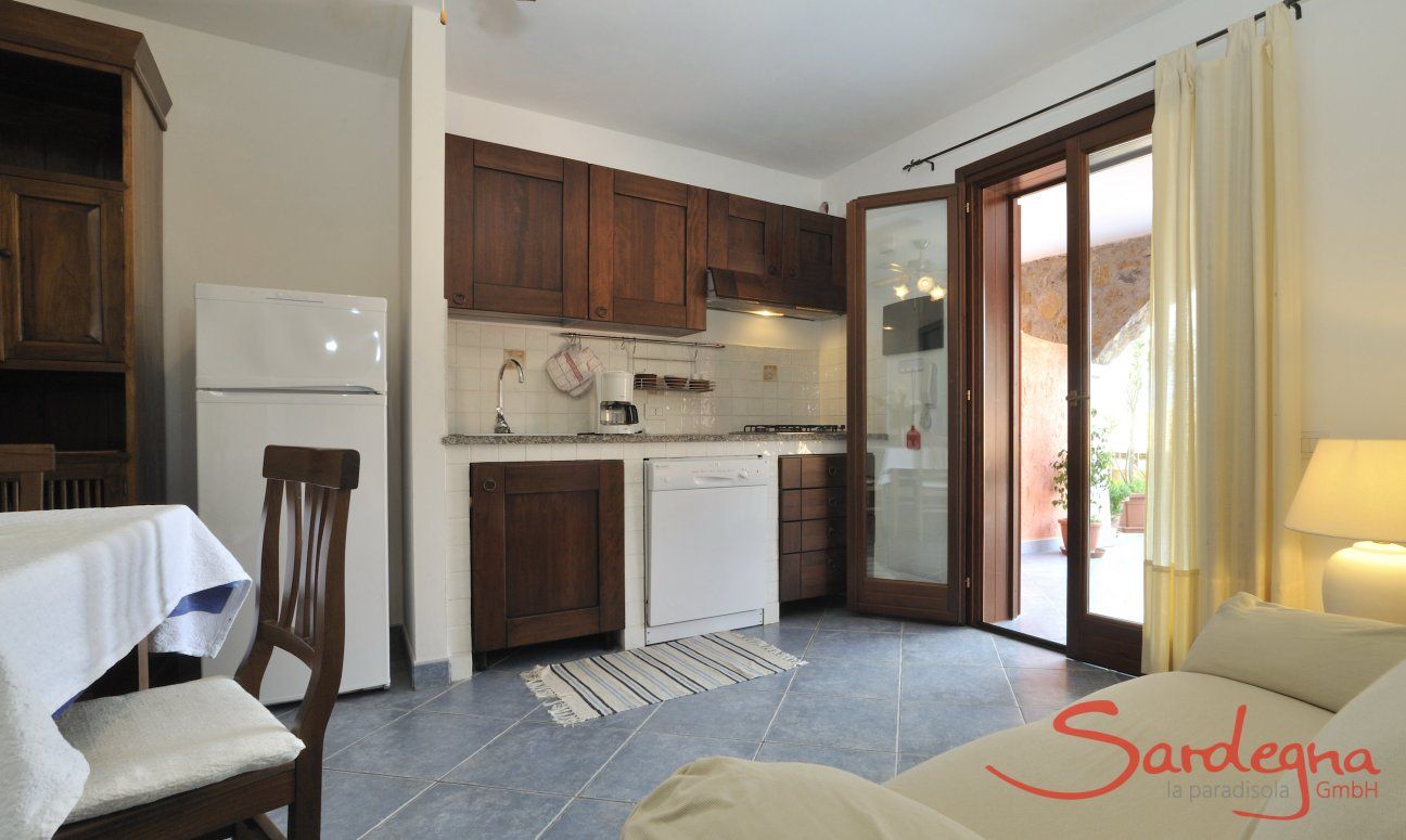 Apartment Castededdu 4 | Living room with kitchen and dining table Living room with kitchen and dining table