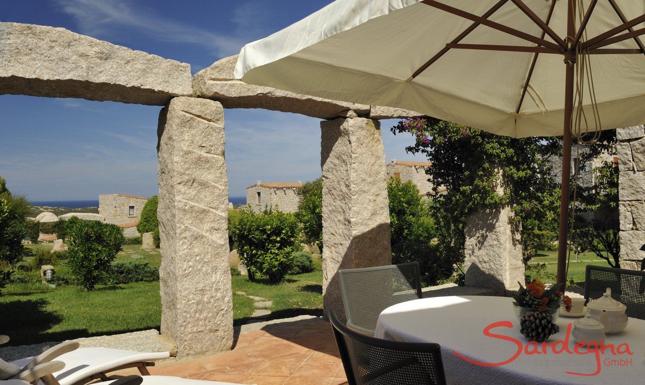 Villa Domus 17 | Terrace with view on the parklike garden Sardinia