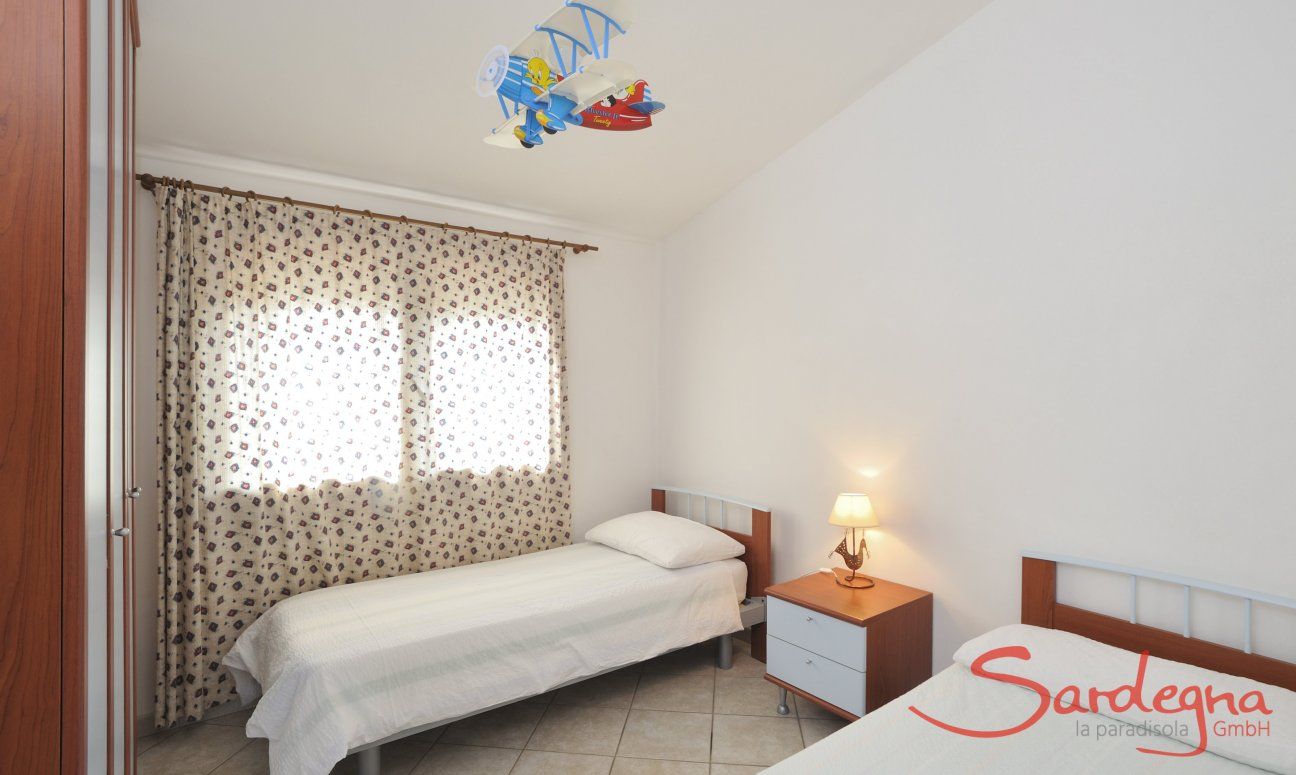 Villa Le Ginestre 2 | Bedroom 4 downstairs with two single beds Bedroom 4 downstairs with two single beds