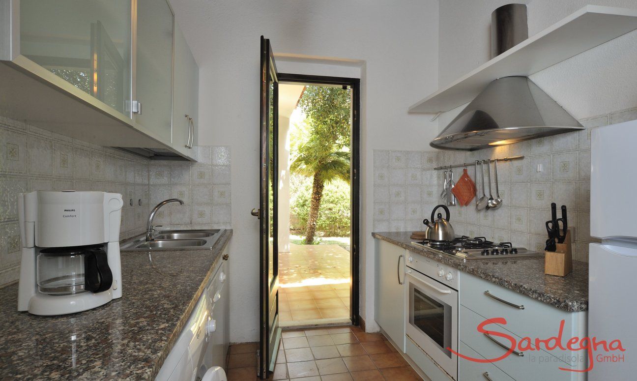 Fully equipped kitchen with garden access