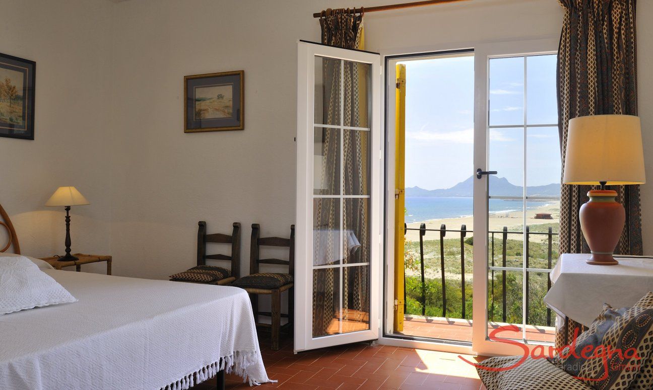 Bedroom 1 with double sized bed and sea view 