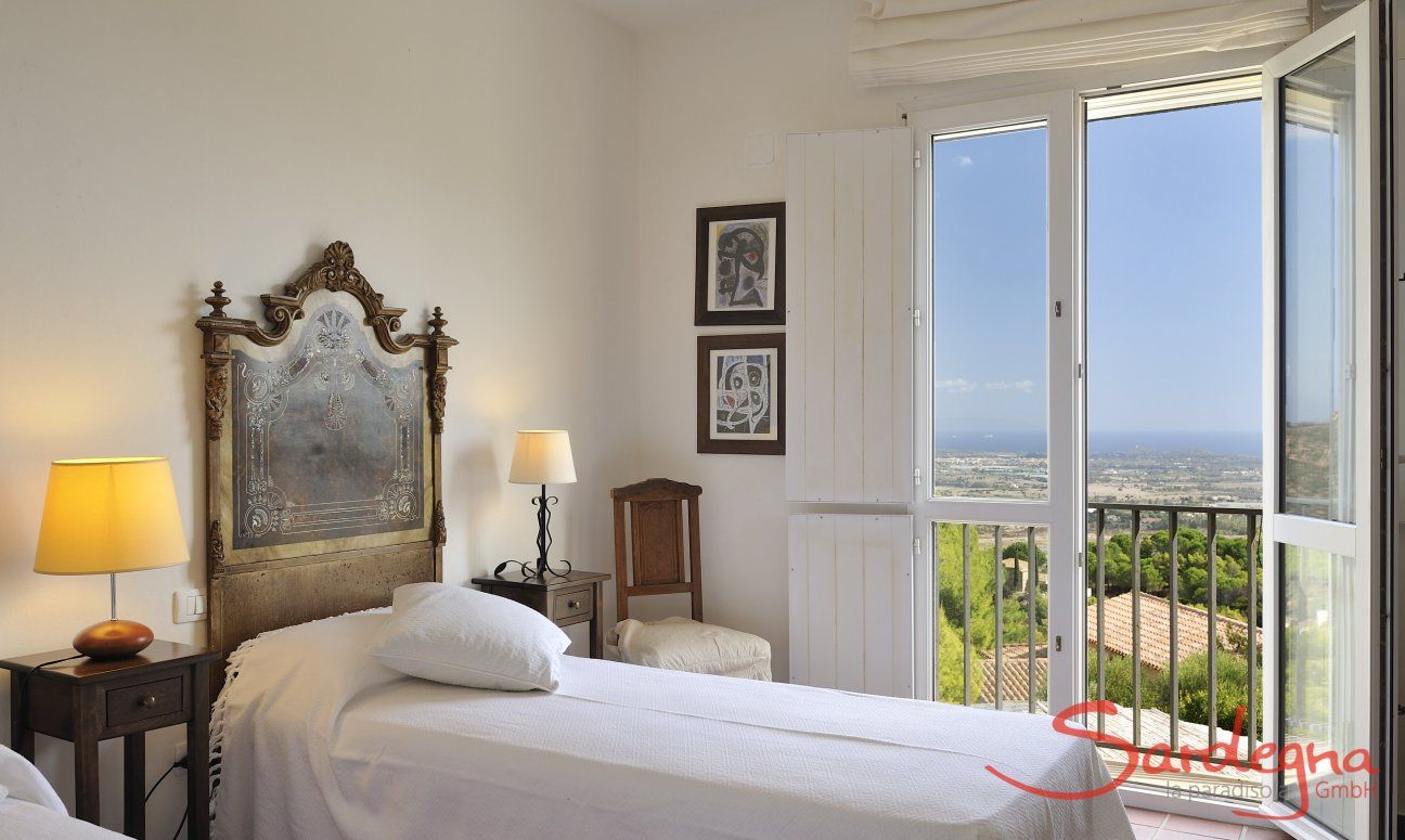 Villa Aquila Alta | Bedroom with view of the outside Sardinia