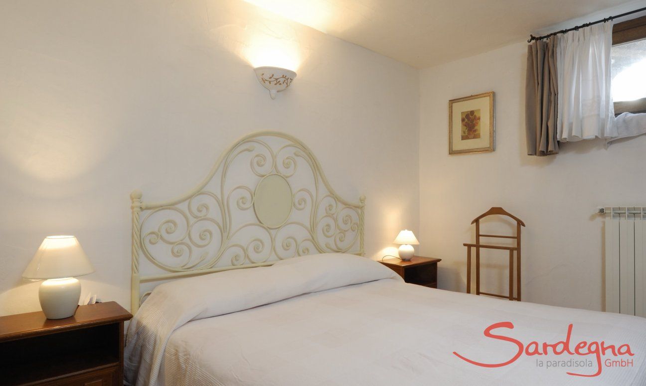 Villa Cala Ginepro | Bedroom 2 (downstairs) with double sized bed Bedroom 2 (downstairs) with double sized bed