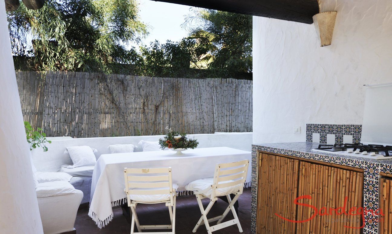 Villa Su Faru 1 | Dining table downstairs outside Dining table downstairs outside