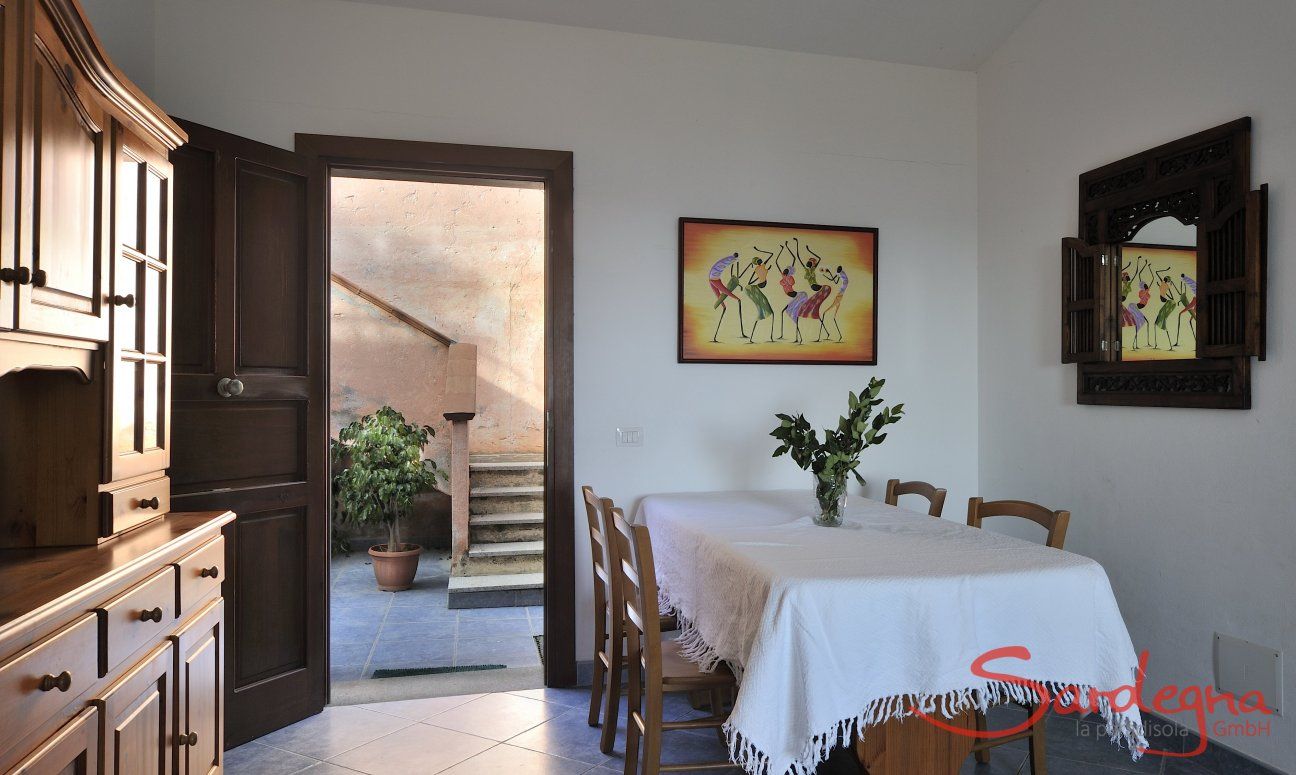 Apartment Castededdu 7 | Living room with dining table and kitchen Dining Area