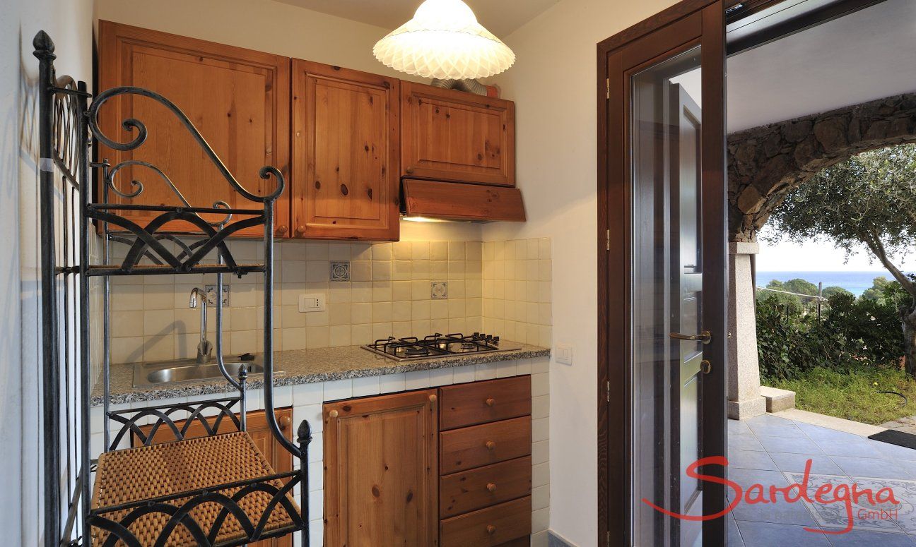 Apartment Castededdu 8 | Kitchen with terrace access Kitchen with terrace access