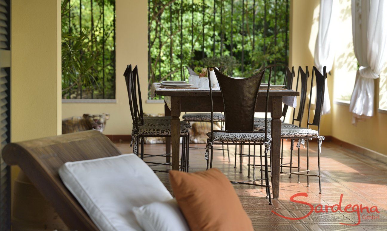Villa Ulivi 12 | Sunlight shining throught the curtains on the terrace Terrace