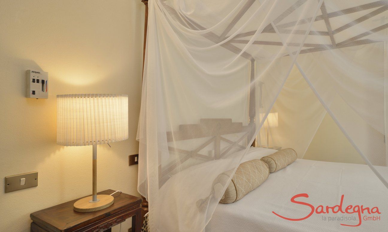 Villa Ulivi 12 | Bedroom 1 with double bed with canopy Bedroom