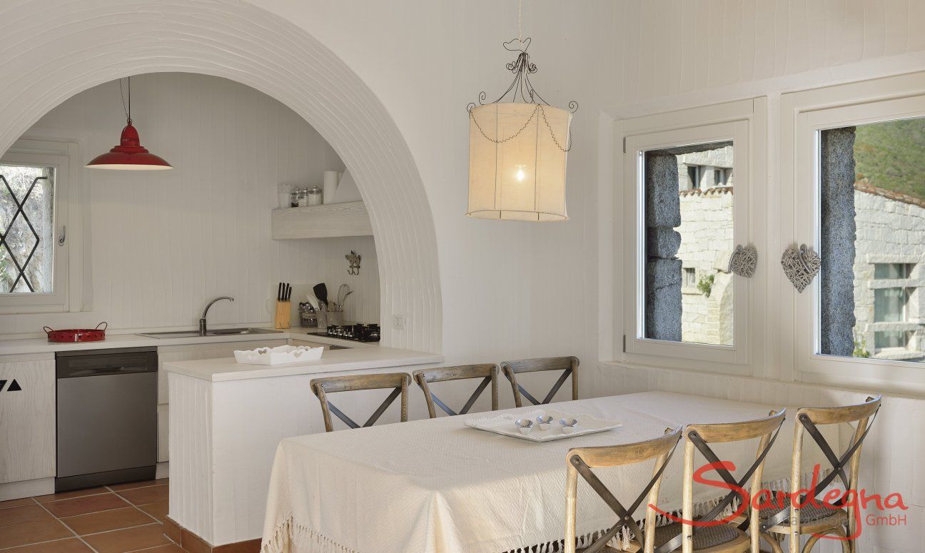 Li Conchi 11 | Dining with kitchen in the background Sardinia