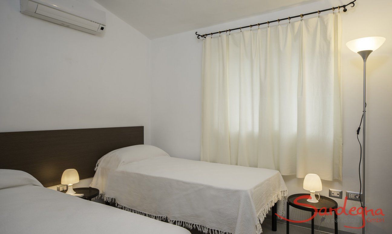 Villa Caterina | Bedroom 2 with two single beds Bedroom