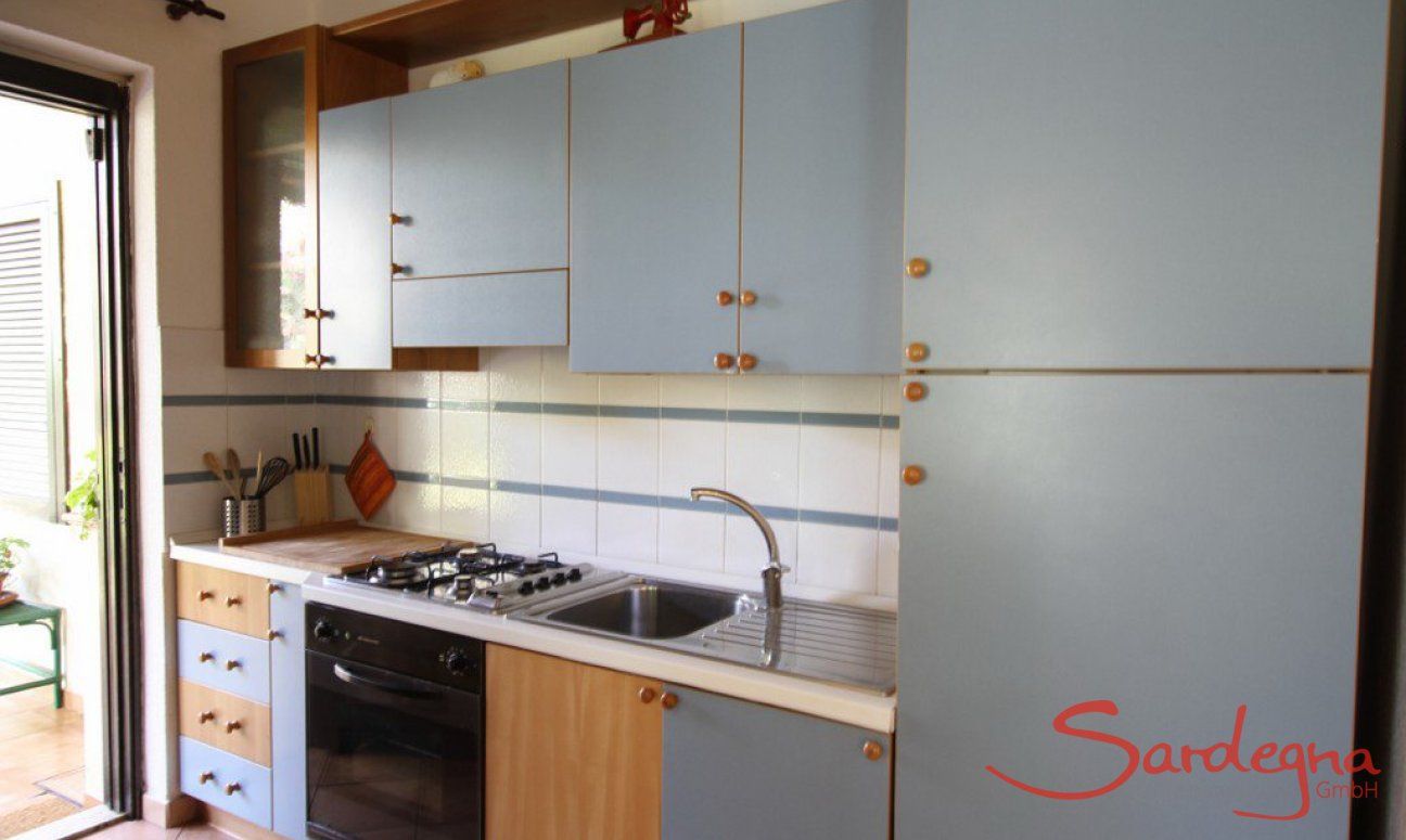 Villa La Viola | Kitchen with all essential devices and garden access Kitchen with all essential devices and garden access