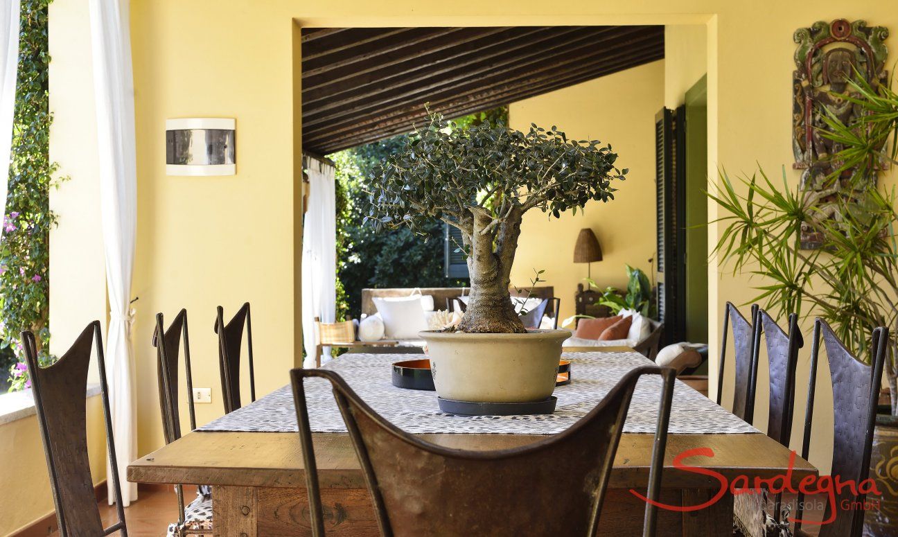 Villa Ulivi 12 | Solid dining table on the terrace giving space for up to eight people Sardinia