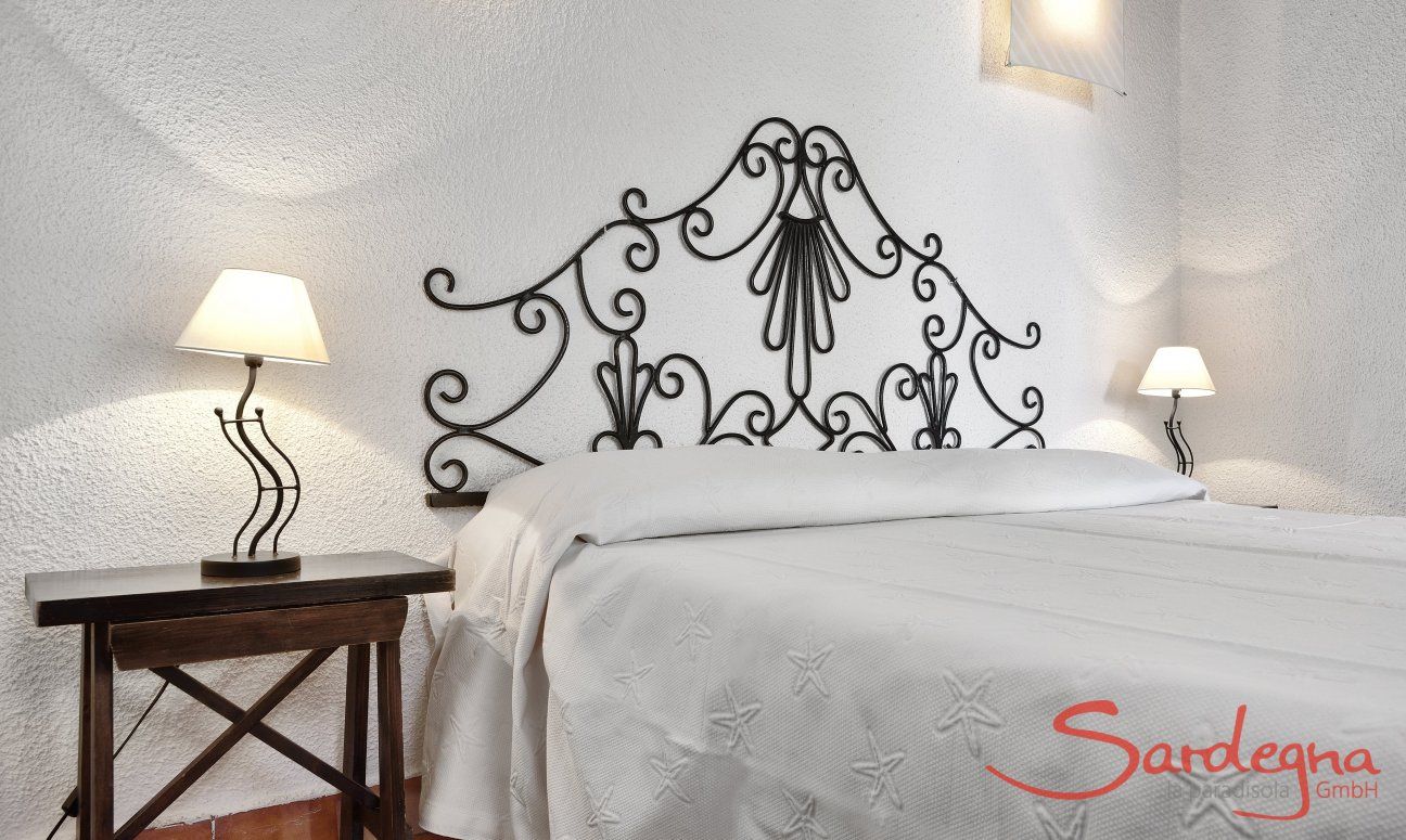 Villetta Quattro | Bedroom with a double sized bed and sea view Bedroom with a double sized bed and sea view