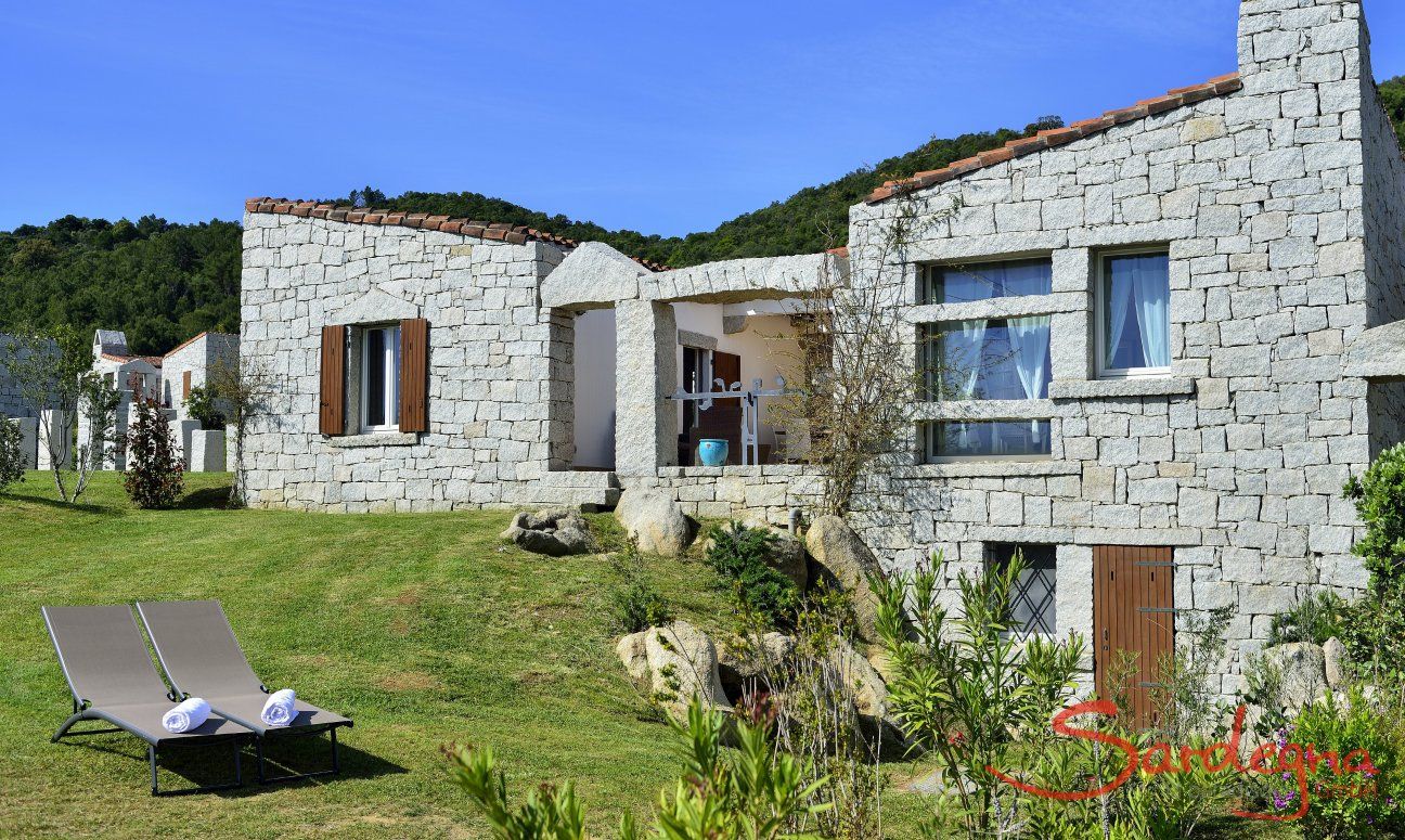 Li Conchi 39 | View of the house with its garden View of the house