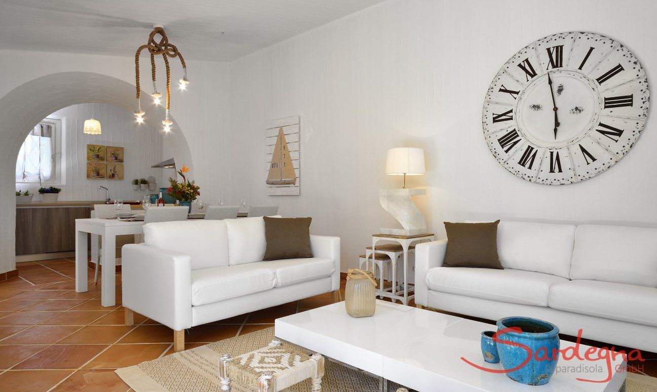 Li Conchi 39 | Living room with sofa corner, dining table and kitchen Relax