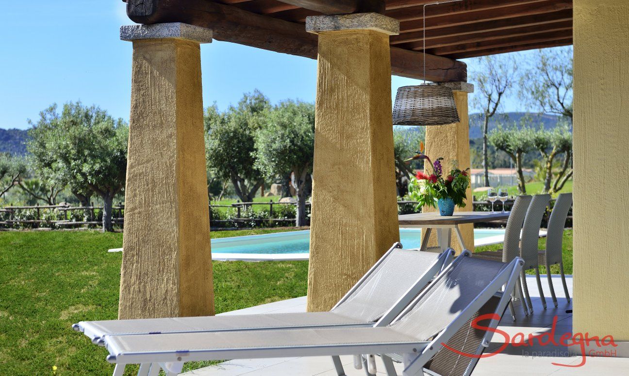 Villa Campidano 20 | Sunbeds in the shade of the roofed terrace Sunbeds on the roofed terrace of Villa Campidano 20