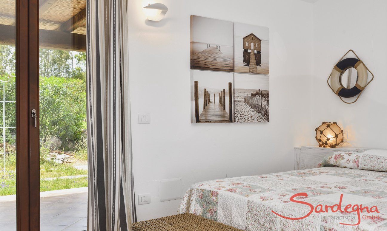 Villa Campidano 7 | Bedroom 4 with its garden access Bedroom
