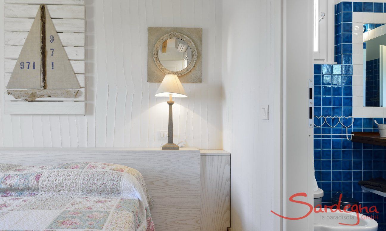 Li Conchi 6 | Bedroom 1 with a view into the bathroom Bedroom