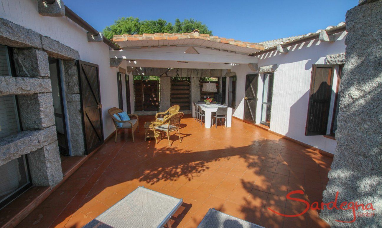 Casa 13 | Sunbeds and dining table on the terrace Sunbeds and dining table on the terrace