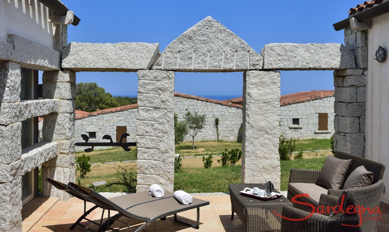 Li Conchi 16 | Patio with sofa, sunbeds and sea view Patio