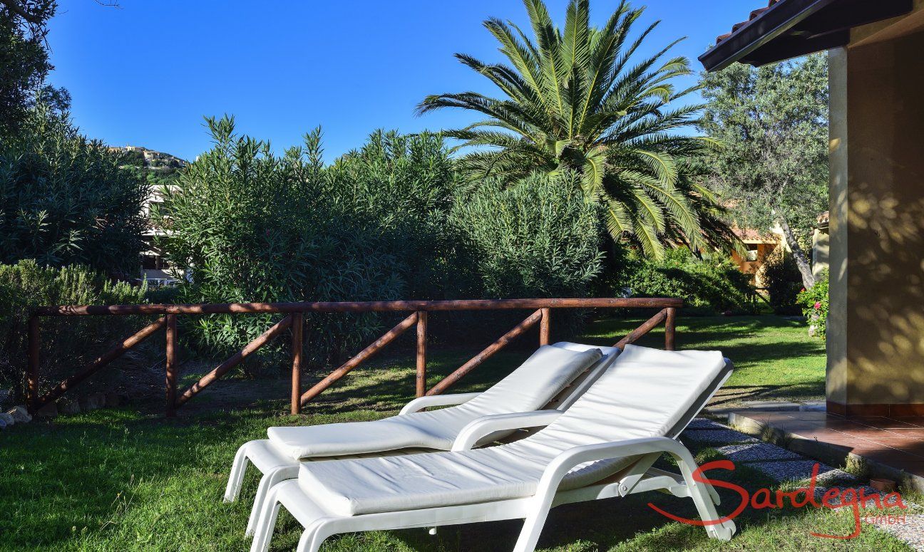 Villa Maria Lina | Garden view with sunbeds Garden view with sunbeds