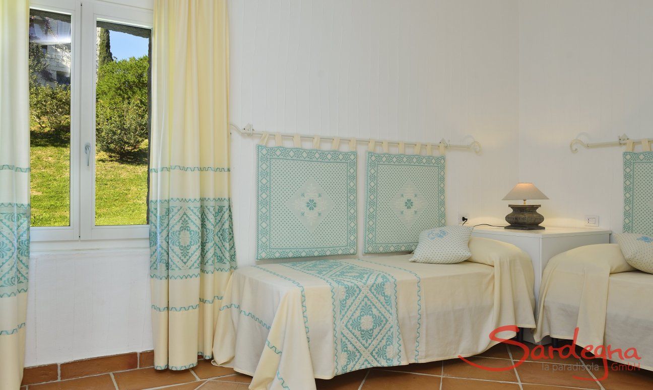 Li Conchi 7 | Bedroom 2 with two single beds Bedroom with two single beds and garden view Li Conchi 7