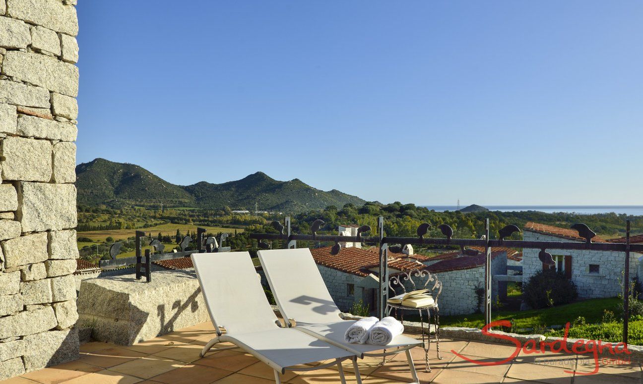 Sunbeds on the terrace of  Li Conchi 10, Cala Sinzias