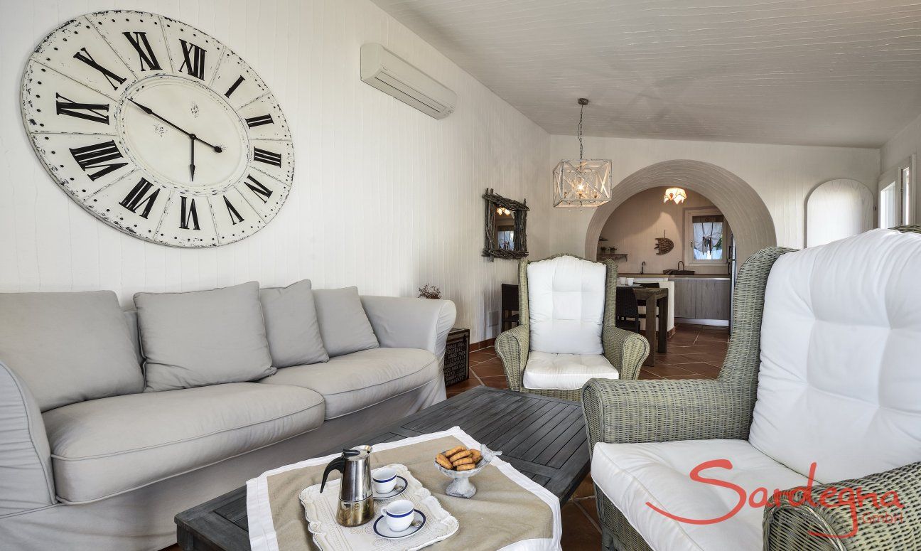 Li Conchi 17 | Sofa corner with large wall clock Sofa corner