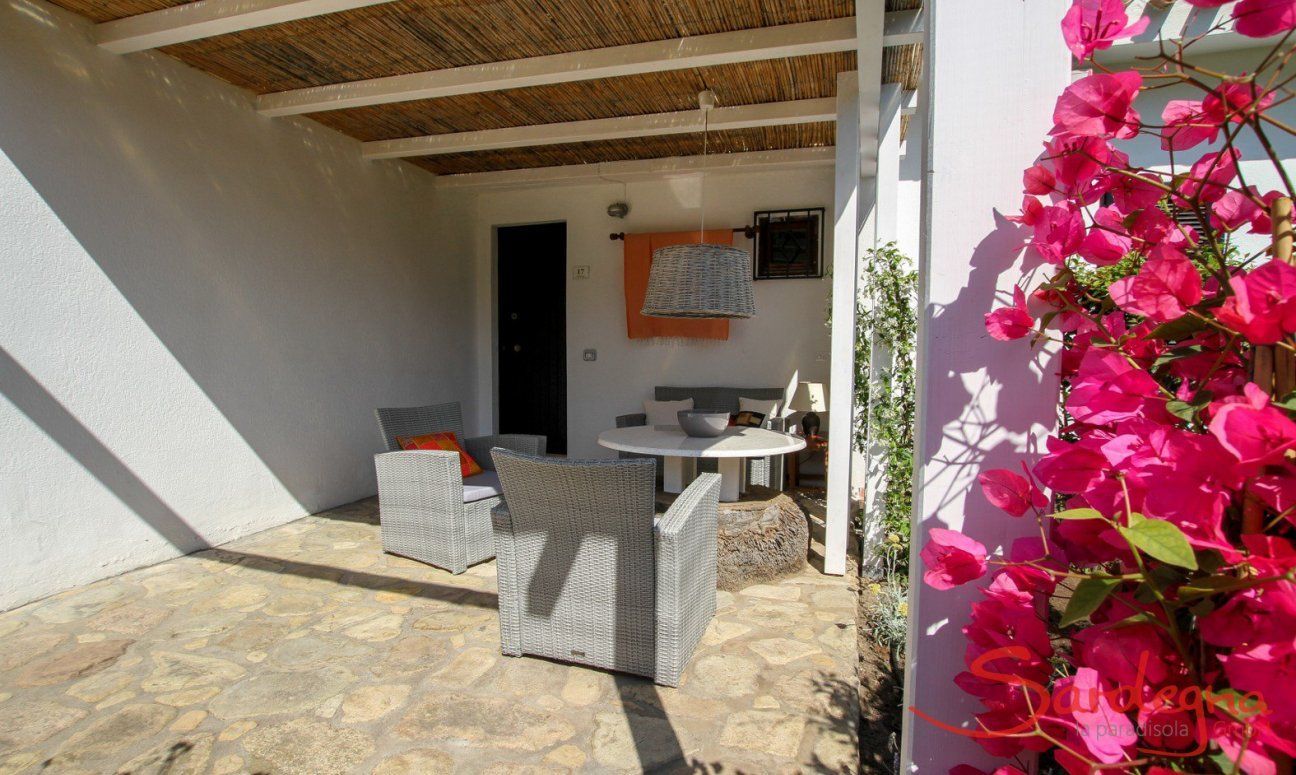 Villetta 12 | Terrace entrance with flowers Terrace entrance with flowers