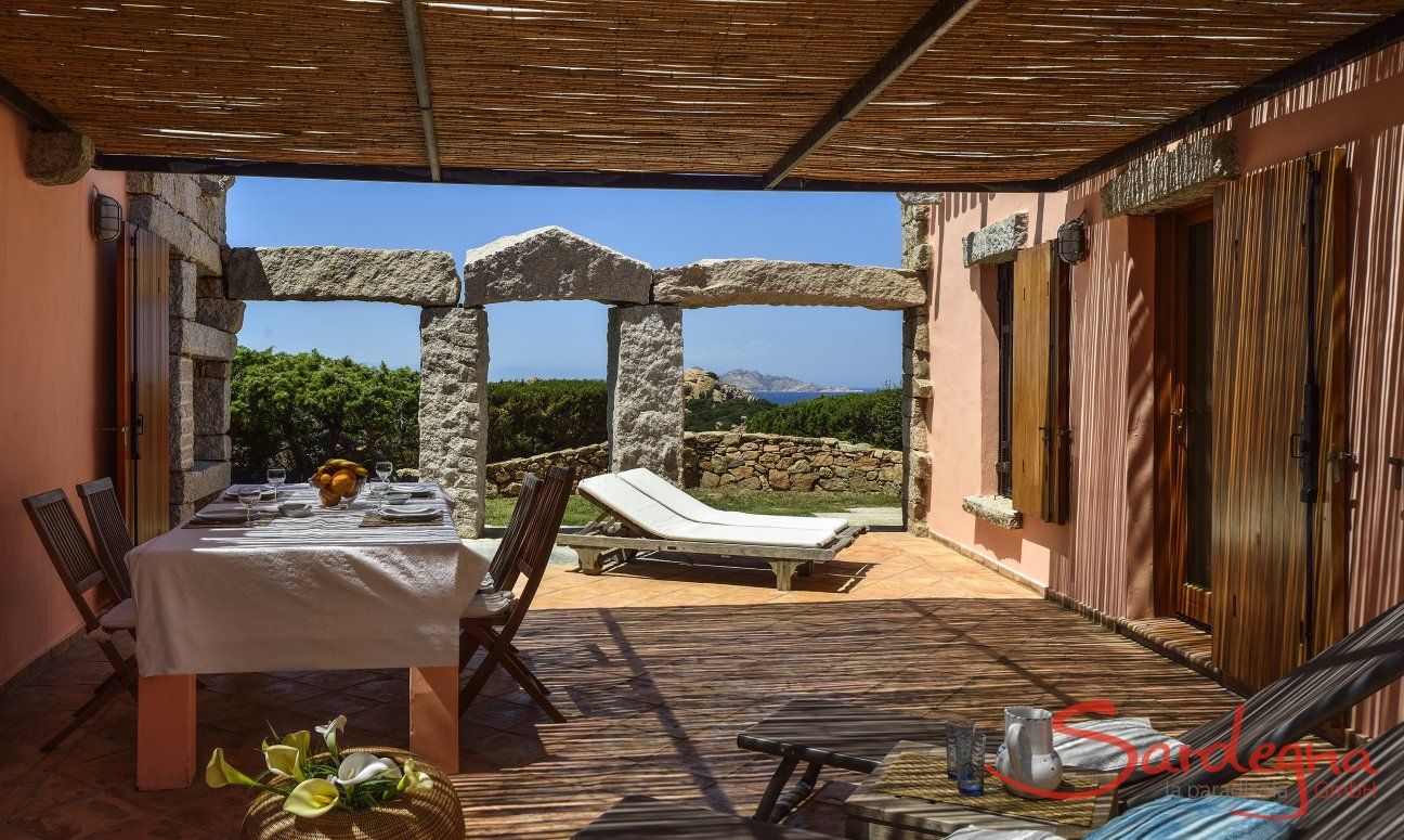 Villa Domus 9d | Terrace with dining area and the sea in the background Terrace with dining area and the sea in the background