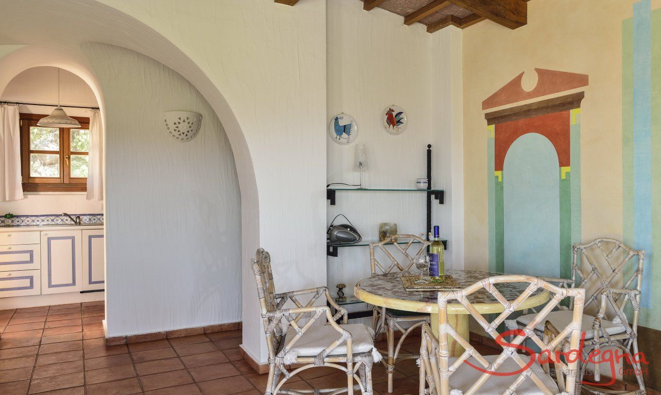 Villa Domus 9d | Living room with a table and view towards the kitchen Living room with a table and view towards the kitchen