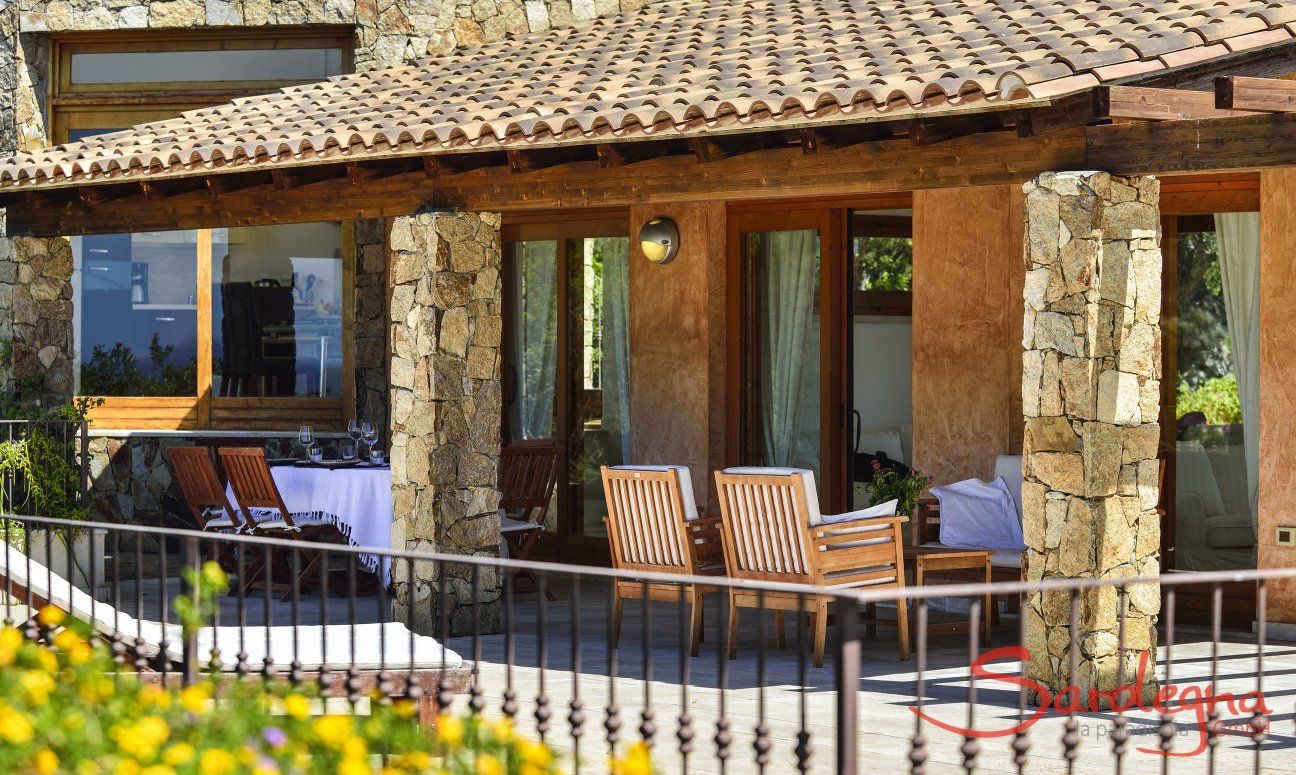 Villa Torretta Chia | View of the dining-and lounge area on the panorama terrace View of the dining-and lounge area