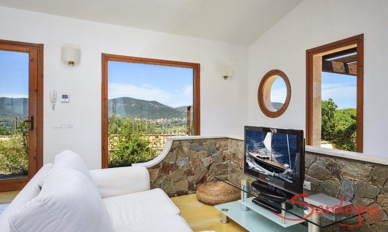 Villa Torretta Chia | Bright living area with a stunning view Bright living area with a stunning view