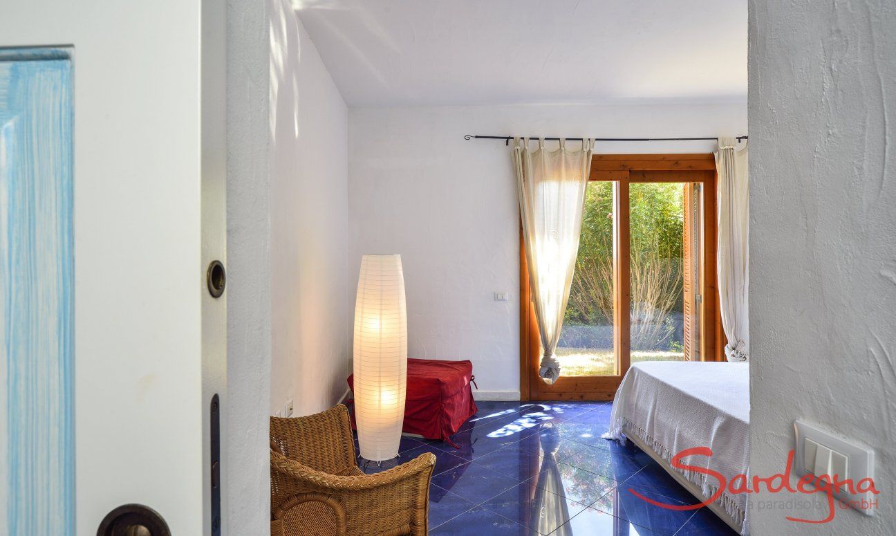 Villa Torretta Chia | Bedroom 3 with double sized bed and garden access Bedroom 3 with double sized bed and garden access
