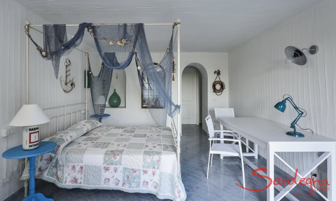 Li Conchi 20 | Bedroom 3 with double bed and desk downstairs Bedroom 3 downstairs