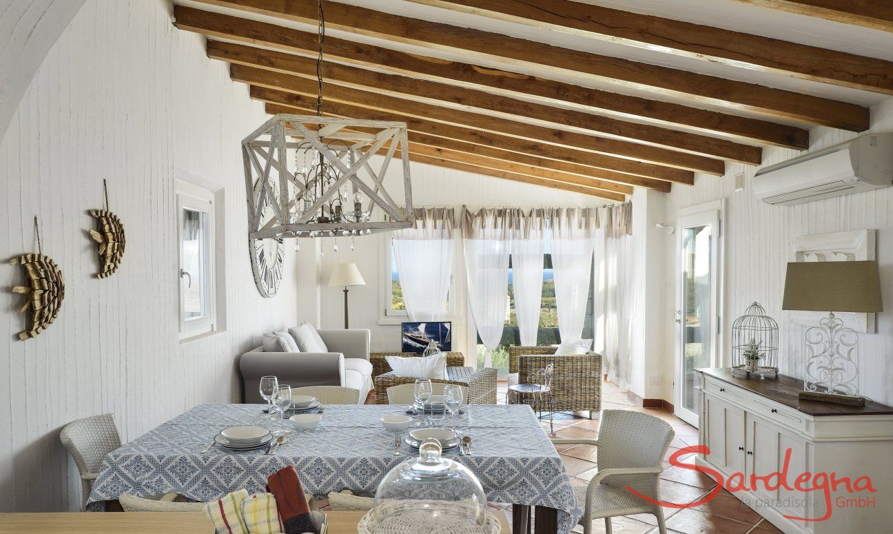 Li Conchi 20 | Dining area and sofa area in the living room N° 20