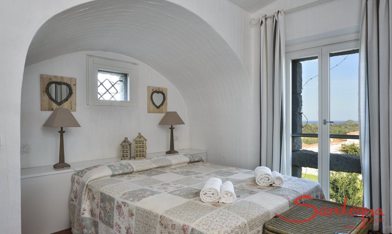 Li Conchi 20 | Master bedroom with double bed and sea view Master Bedrrom