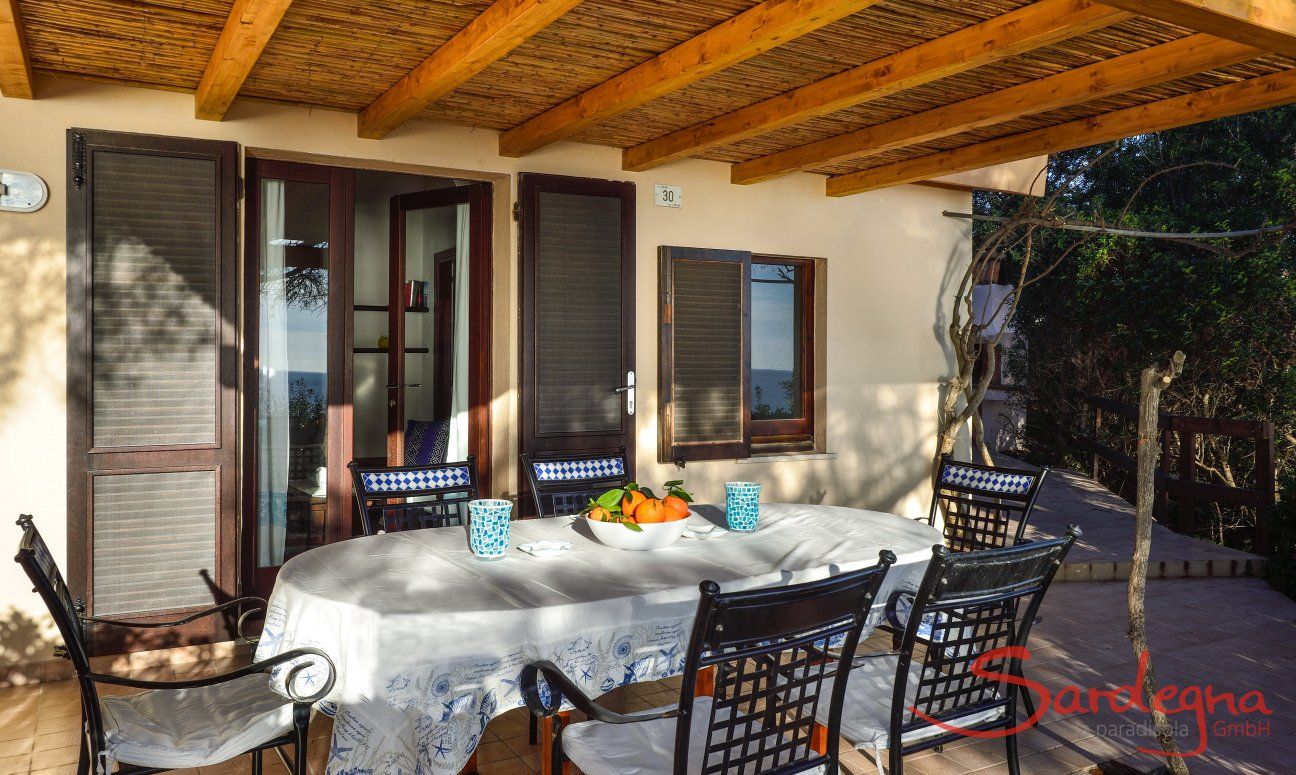 Nido 1 | Shaded Terrace with a dining table Shaded Terrace with a dining table