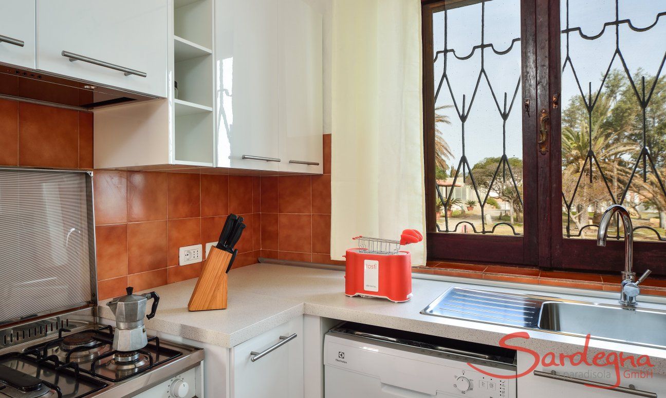 Villa Su Faru 1 | Kitchen with big stove, oven and dishwasher Kitchen