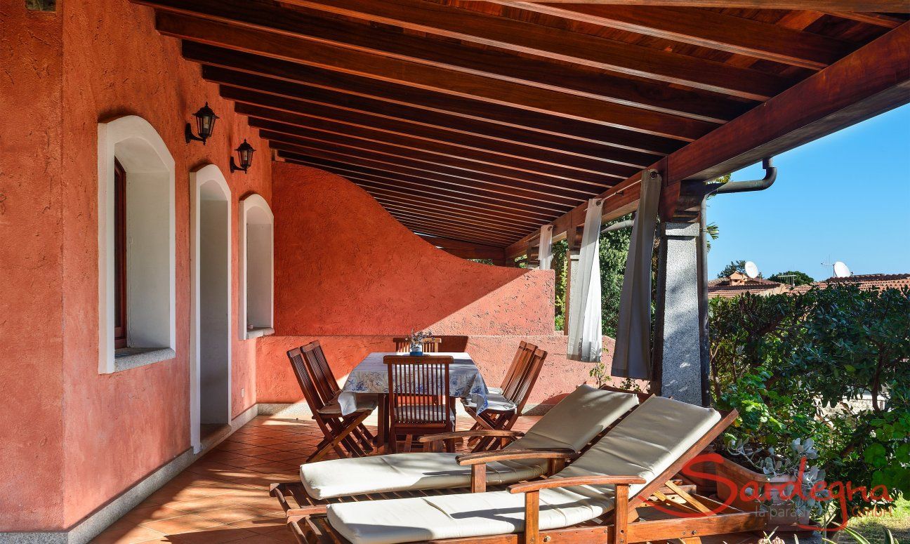 Villa Le Ginestre 1 | Relaxing on the roofed terrace Relaxing on the roofed terrace