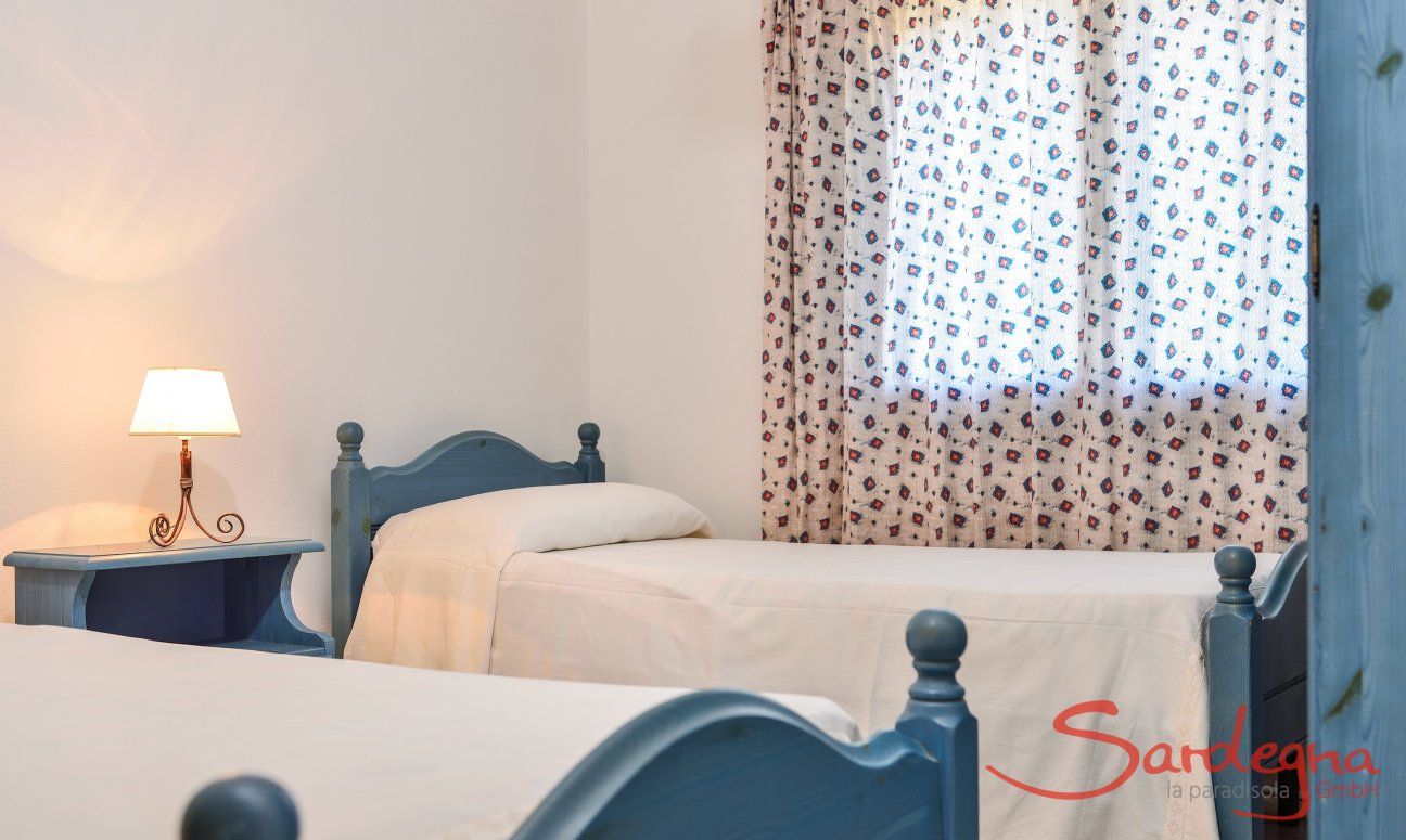 Villa Le Ginestre 1 | Bedroom 1 upstairs with two single beds Bedroom 1 upstairs with two single beds