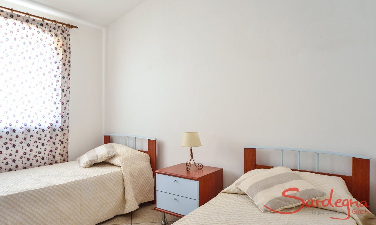 Villa Le Ginestre 2 | Bedroom 2 upstairs with two single beds Bedroom 2 upstairs with two single beds
