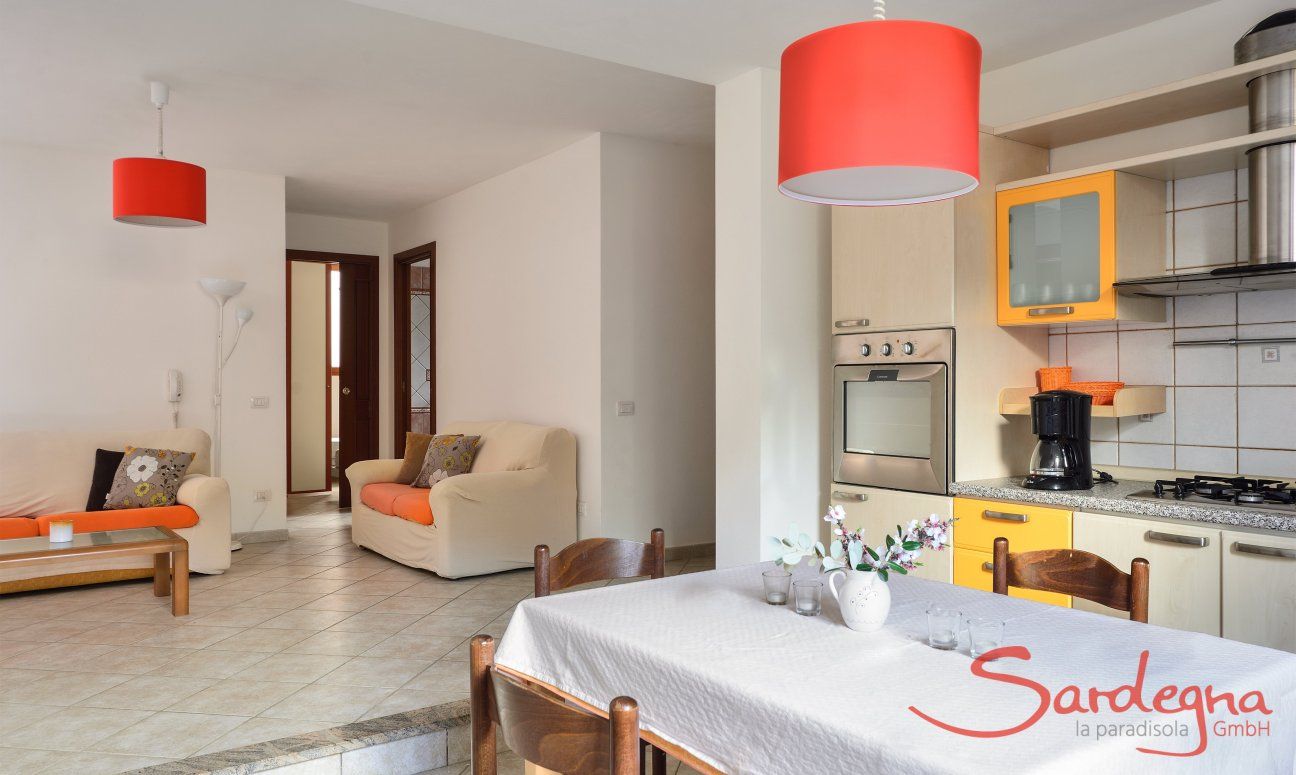 Villa Le Ginestre 2 | Living area souterrain with kitchen and sofa corner Living area souterrain with kitchen and sofa corner