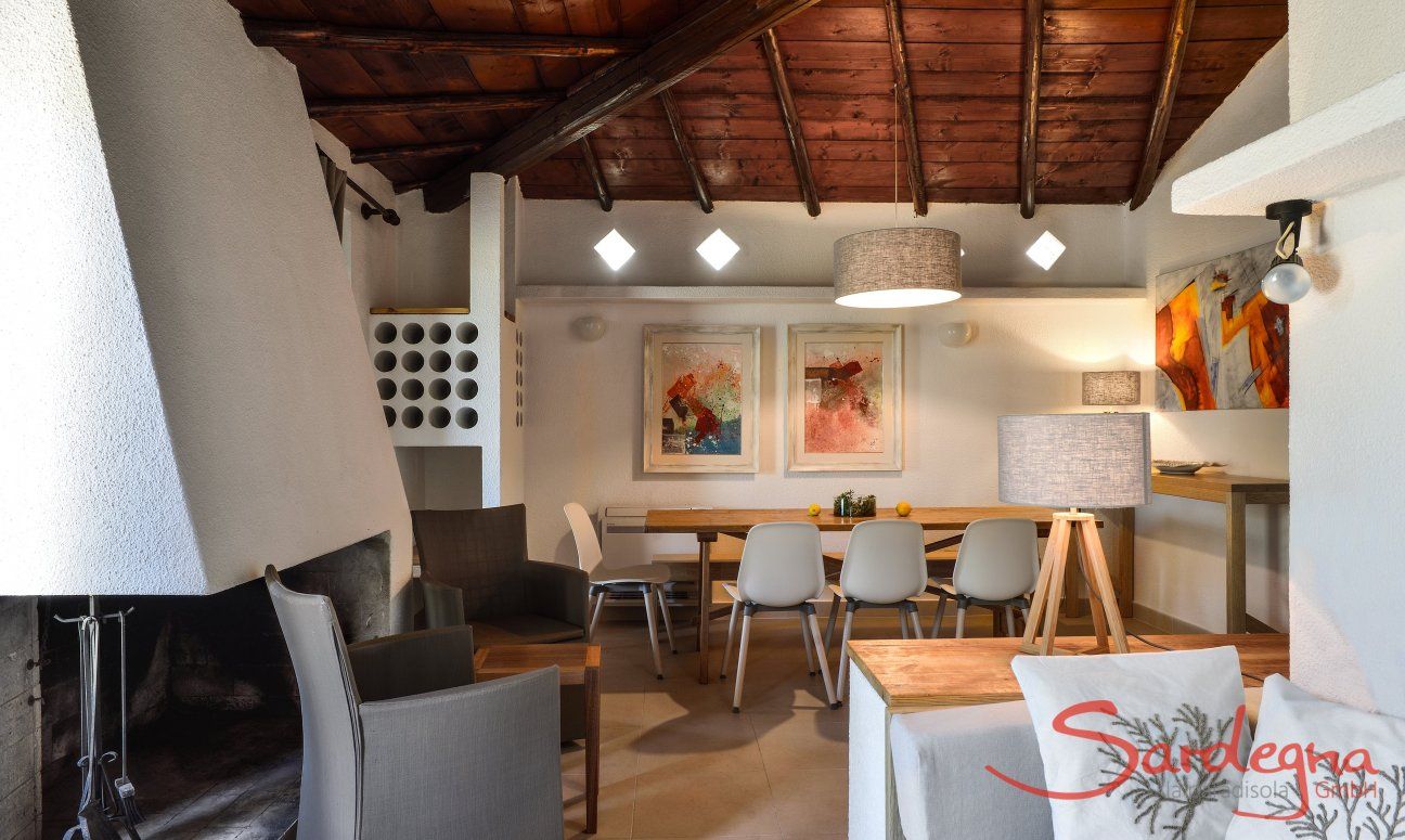 Villetta Quattro | Modern living room with a big fire place Modern living room with a big fire place