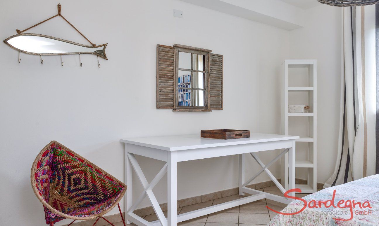 A writing desk in bedroom 1 